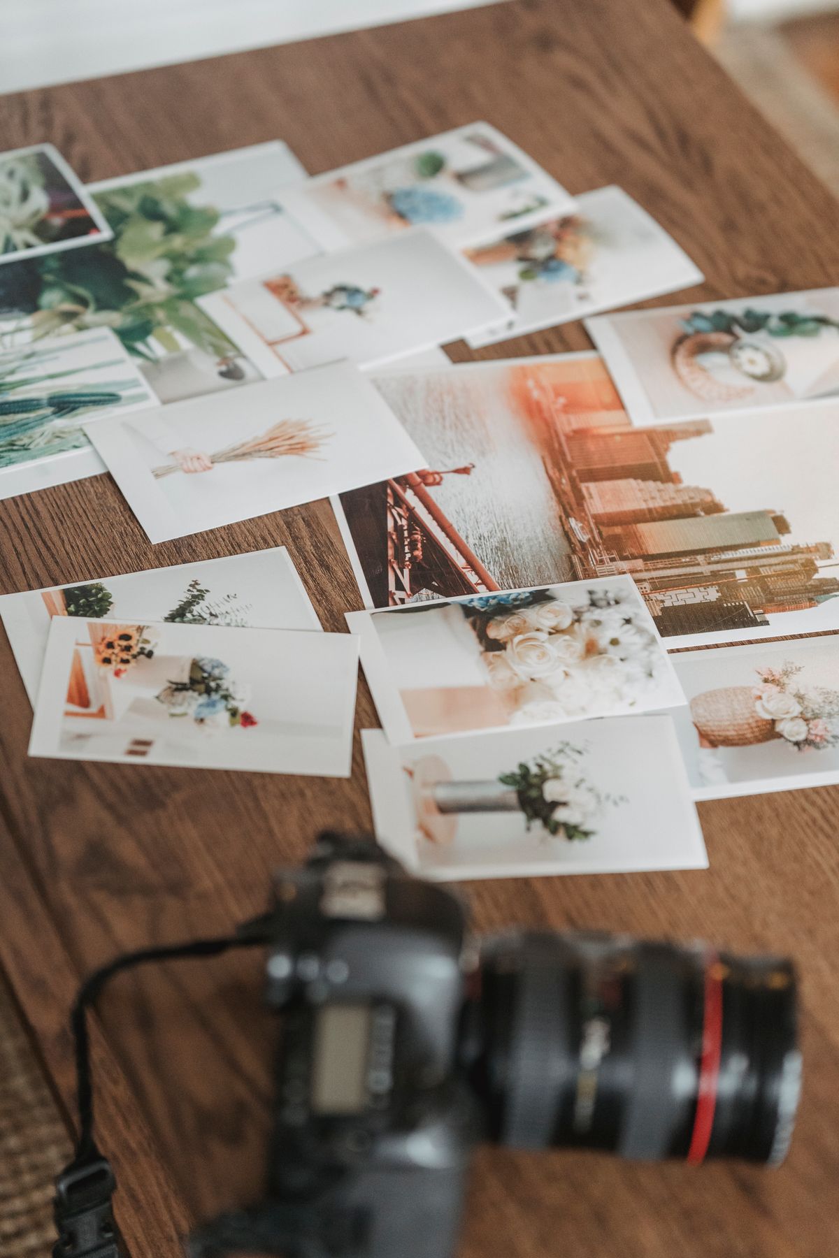 Photographs spread across a table